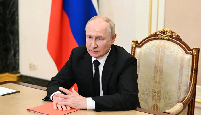 Russian President Vladimir Putin chairs a Security Council meeting via a video conference at the Kremlin in Moscow on August 4, 2023. — AFP