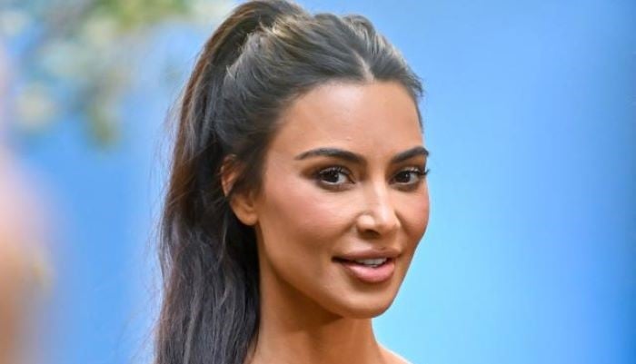 Kim Kardashian shares shoulder injury, works with trainer for fitness recovery