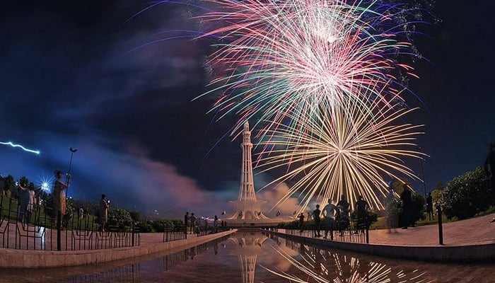 People watch beautiful fireworks amid celebrations, on August 14, 2022. — Online