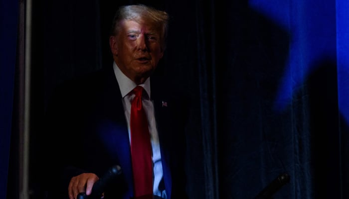 Former President Donald Trump takes the stage as the keynote speaker at the 56th Annual Silver Elephant Dinner on August 5, 2023, in Columbia, South Carolina. — AFP