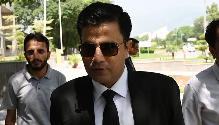 Naeem Haider Panjutha (C), lawyer and legal team member of Imran Khan, arrives at the high court to file petition against the PTI chiefs conviction in Islamabad on August 8, 2023. — AFP