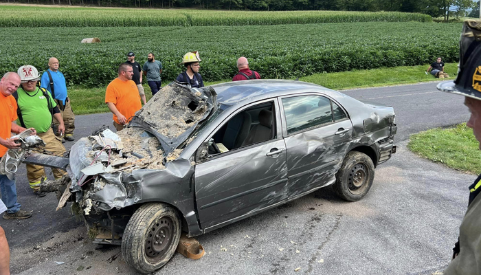 The damaged car can be seen after it smashed into the second floor of a house in Lewistown Pennsylvania in this picture released on August 7, 2023. — Facebook/Junction Fire Company