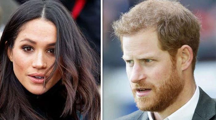 Prince Harry, Meghan Markle are ‘faking’ candid lovey-dovey image