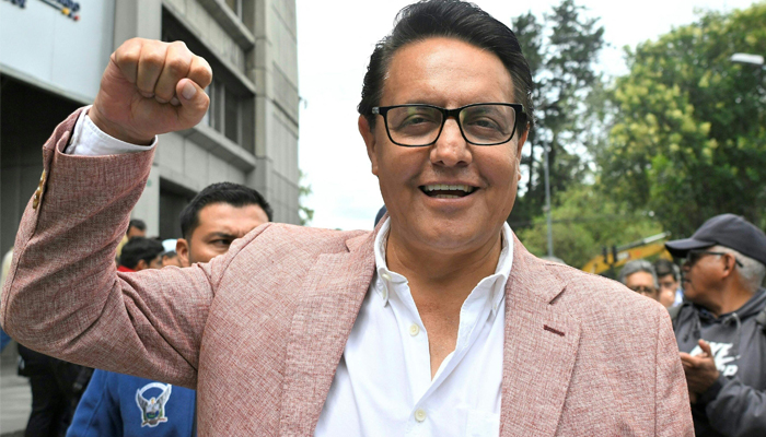 Former Assembly member and now presidential candidate, Fernando Villavicencio, gestures outside the Attorney Generals Office in Quito on August 8, 2023. — AFP