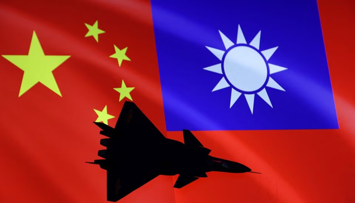 An airplane is seen in front of Chinese and Taiwanese flags in this illustration, August 6, 2022. — Reuters