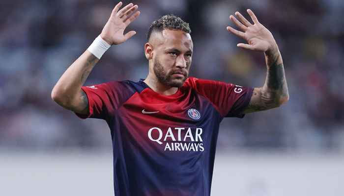 Paris Saint-Germains Neymar Jr waves to the crowd during a warm down following the friendly football match between PSG and Saudi Arabias Al-Nassr at Nagai Stadium in Osaka on July 25, 2023. — AFP