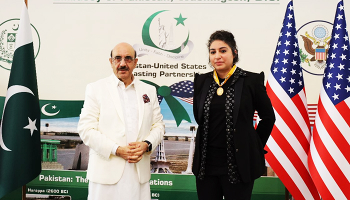 Grammy award winner Arooj Aftab (right) poses with Pakistans Ambassador to the United States Masood Khan in Washington, on August 15, 2023. — Twitter@PakinUSA