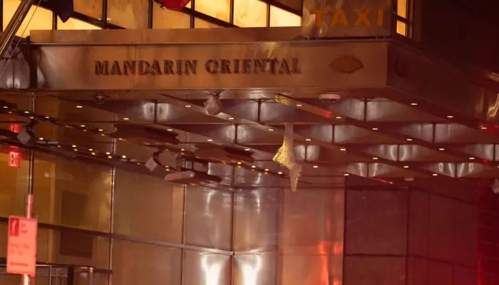 The image shows the entrance of the Mandarin Oriental Hotel, in New York City. — Twitter/File