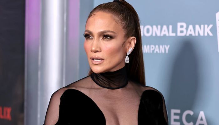 Jennifer Lopez stuns while enjoying a vacation in new photos