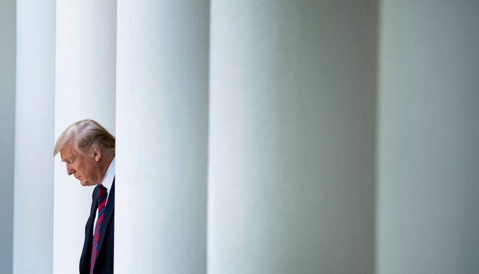 Former US President Donald Trump arrives to announce a new immigration proposal, in the Rose Garden of the White House in Washington, DC. — AFP/File