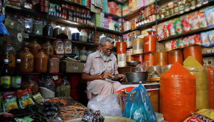 A shopkeeper at a store in this undated picture. — Reuters/File