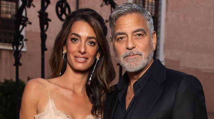 Amal Clooney honors husband George at DVF Awards