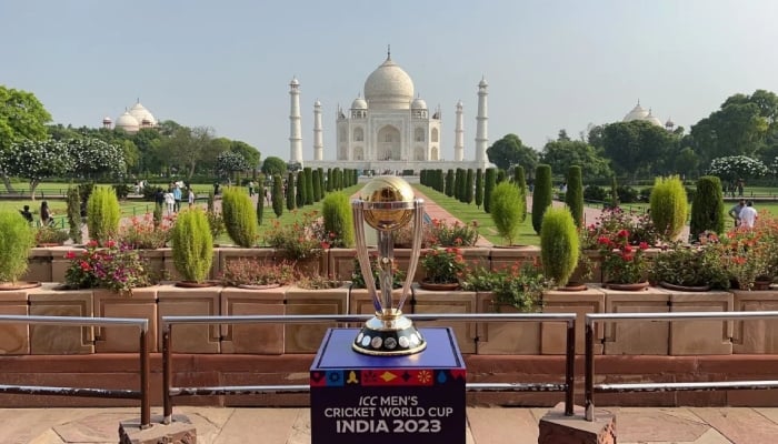 The 2023 ODI World Cup trophy in front of the Taj Mahal. — ICC/File