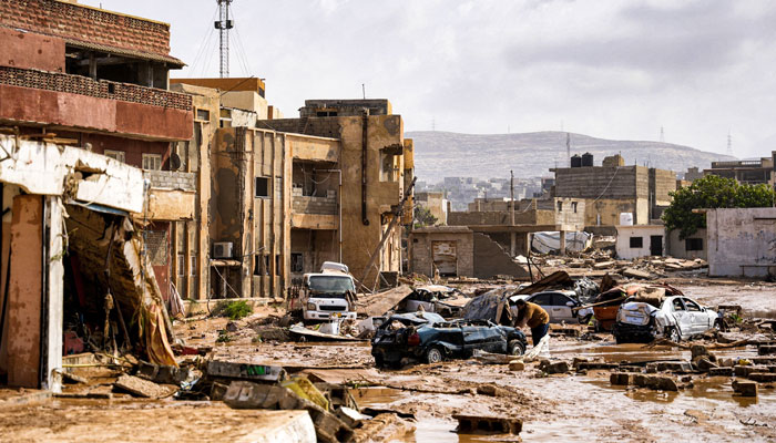 A view of destroyed vehicles and damaged buildings in the eastern city of Benghazi in the wake of the Mediterranean storm Daniel, on September 11, 2023. — AFP