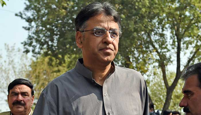 PTI Secretary-General Asad Umar seen in this still from a public gathering. — AFP/File