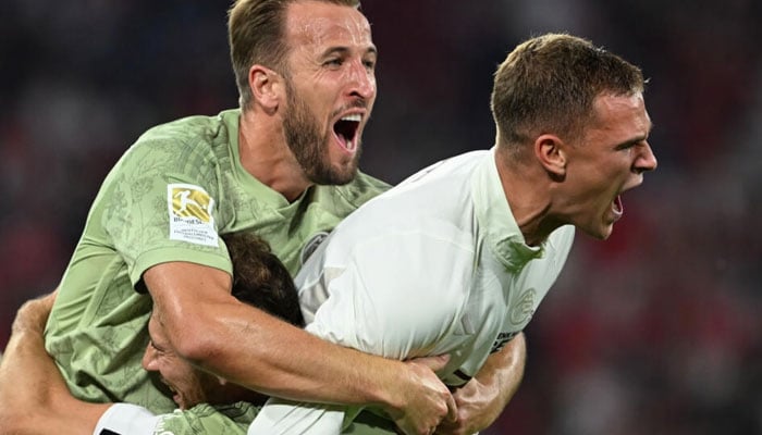 Bayern Munich midfielder Joshua Kimmich (R) and striker Harry Kane. Bayern drew 2-2 at home to Bayer Leverkusen on Friday. AFP