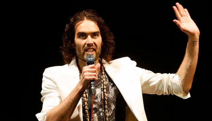 Russell Brand gets standing ovation at Wembley show despite sexual assault allegations