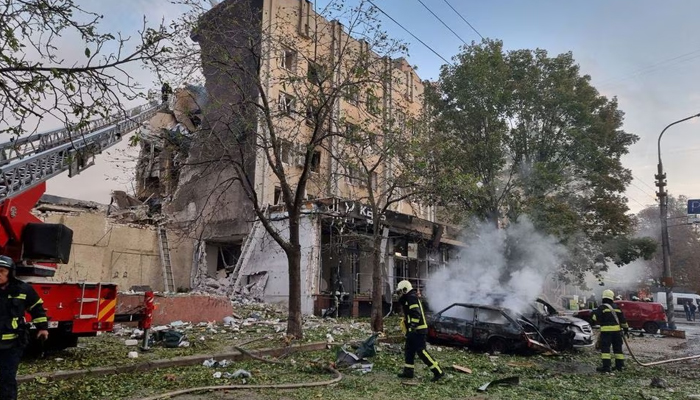 Emergency members work by a damaged building and burnt vehicles in the aftermath of a Russian military strike, amid the Russia-Ukraine war on September 21, 2023. — Reuters