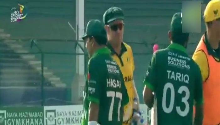 Pakistani players shaking hands with their Australian counterparts after winning the Over 40s Global Cup group stage match at National Stadium Karachi on September 22, 2023. — Geo Super