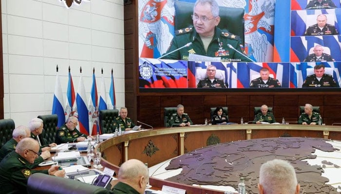 Russian Defence Minister Sergei Shoigu chairs a meeting with the leadership of the Armed Forces, as Russian fleet commanders are seen on a screen via video link, in Moscow, Russia, in this picture released September 26, 2023.—Reuters