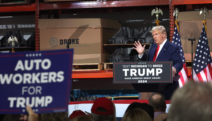 Former President Donald Trump speaks at a campaign rally at Drake Enterprises, an automotive parts manufacturer, on September 27, 2023, in Clinton Township, Michigan. — AFP