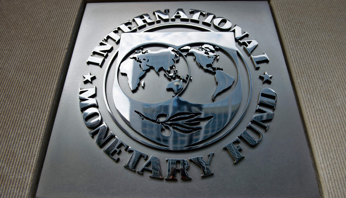 A logo is seen outside the headquarters of the International Monetary Fund June 30, 2015 in Washington, DC. — AFP