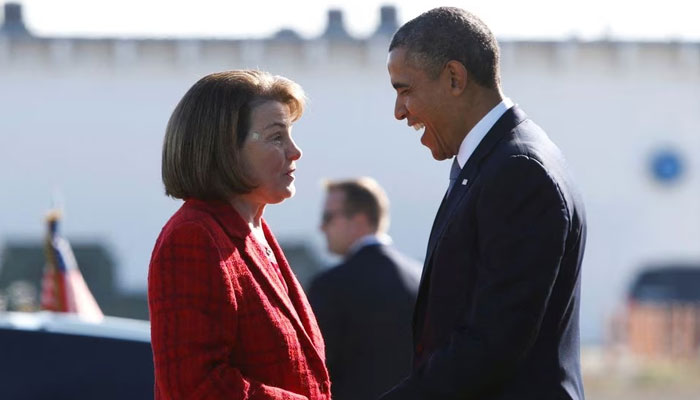 US President Barack Obama is greeted by U.S. Senator Diane Feinstein (D-CA) upon his arrival in San Francisco, November 25, 2013. — Reuters