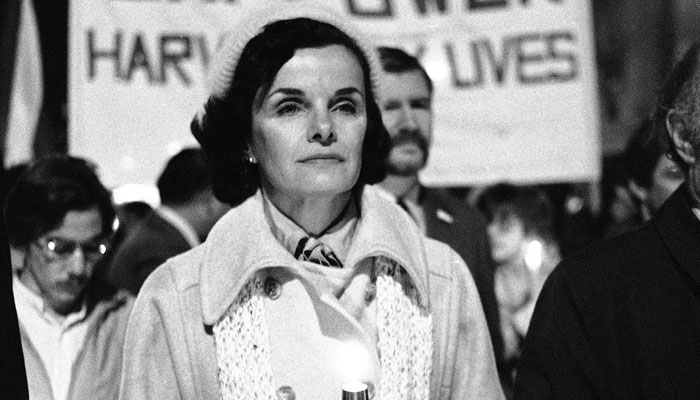 San Francisco mayor Dianne Feinstein carries a candle as she lead an estimated 15,000 marchers in memory of slain mayor George Moscone and supervisor Harvey Milk in San Francisco, Nov. 28, 1979.—AFP