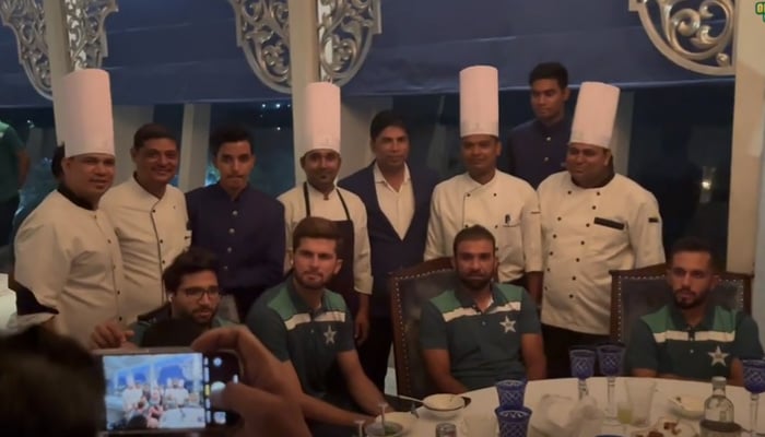 Restaurant staff have their photographs made with the Pakistan cricket team at a eatery in Hyderabad, India,on September 30, 2023, in this still taken from a video. — Twitter/@TheRealPCB