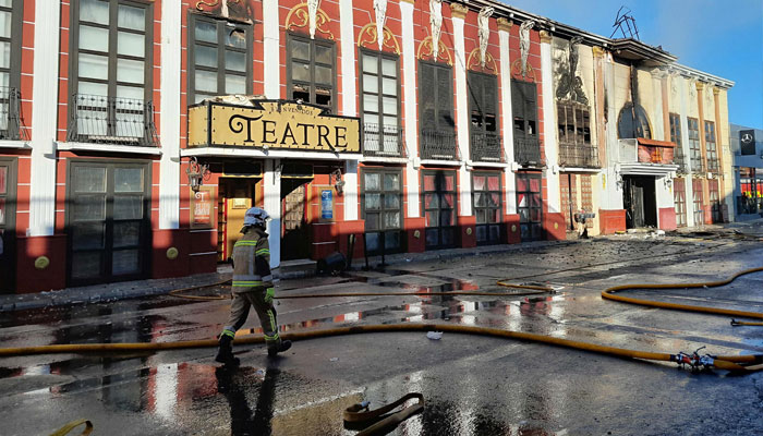 This handout photograph taken and released on October 1, 2023 by the 112 Emergency Services of the Murcia Region shows firefighters getting ready near the Teatre nightclub as at least thirteen people were killed in a fire, in Murcia.—AFP