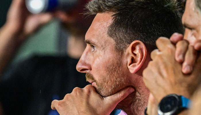 Inter Miami´s Argentine forward #10 Lionel Messi watches the Major League Soccer (MLS) football match between Inter Miami CF and New York City FC from the stands at DRV PNK Stadium in Fort Lauderdale, Florida, on September 30, 2023.—AFP