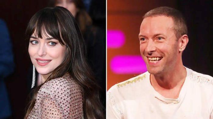 Dakota Johnson celebrated an early birthday with Chris Martin at a Coldplay concert