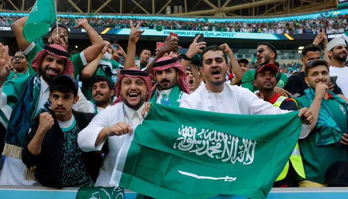 Saudi Arabia fans celebrate their teams victory over Argentina 2-1 during the Qatar 2022 World Cup football at Lusail Stadium, on 22 November 2022.—AFP