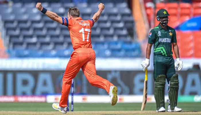 Netherlands Logan van Beek (L) celebrates after taking the wicket of Pakistans Fakhar Zaman (R) during the 2023 ICC Mens Cricket World Cup one-day international (ODI) match between Pakistan and Netherlands at the Rajiv Gandhi International Stadium in Hyderabad on October 6, 2023. — AFP