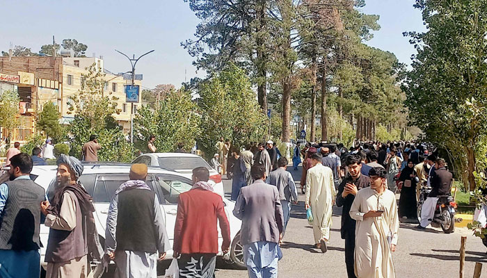 People gather on the streets in Herat on October 7, 2023. A magnitude 6.3 earthquake hit western Afghanistan October 7 morning, the United States Geological Survey said, followed by four large aftershocks with epicentres close to the region´s largest city. — AFP