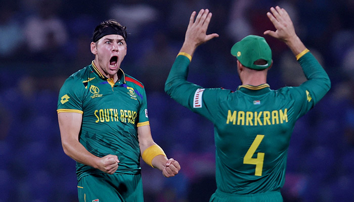 Cricket - ICC Cricket World Cup 2023 - South Africa v Sri Lanka - Arun Jaitley Stadium, New Delhi, India - October 7, 2023 South Africas Gerald Coetzee celebrates with Aiden Markram after taking the wicket of Sri Lankas Dunith Wellalage. — Reuters