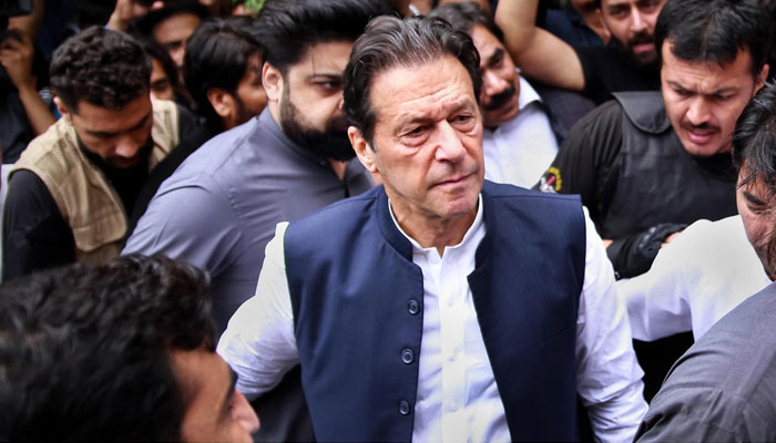 Former prime minister and Chairman of Pakistan Tehreek-e-Insaf (PTI) Imran Khan arrives for a hearing in an Anti-Terrorism Court (ATC) on August 25, 2022. — APP