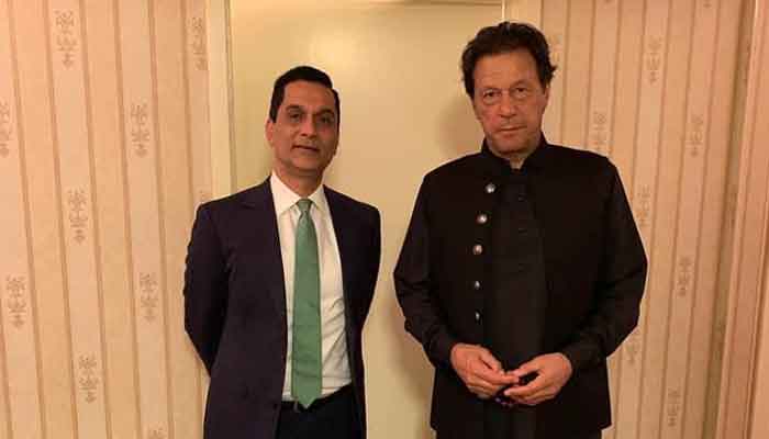 Tahir Javed with former prime minister Imran Khan in the file photo. — picture by reporter