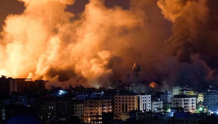 Flames and smoke billow during Israeli strikes in Gaza, October 9, 2023. — Reuters