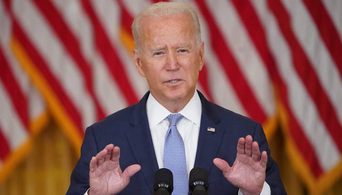 US President Joe Biden speaks in the East Room of the White House in Washington, DC, on August 12, 2021. — AFP