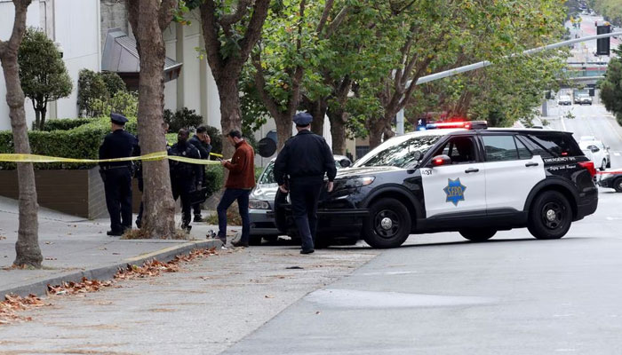 Law enforcement members stand on the street near the Chinese consulate, where local media has reported a vehicle may have crashed into the building, in San Francisco, California, U.S. October 9, 2023. — Reuters