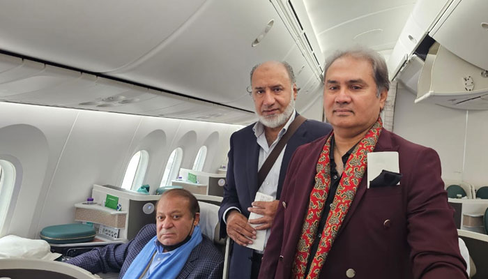 Nawaz Sharif inside the plane with Mian Nasir Janjua and Karim Yousaf on way to Saudi Arabia. Reporter