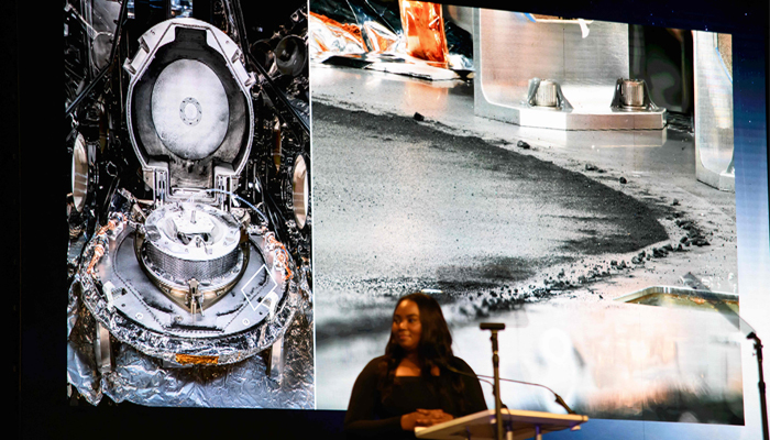 A picture of some of the sample matter collected from the asteroid is displayed during a press conference for the OSIRIS-REx sample unveiling at the Johnson Space Center in Houston, Texas on October 11, 2023.