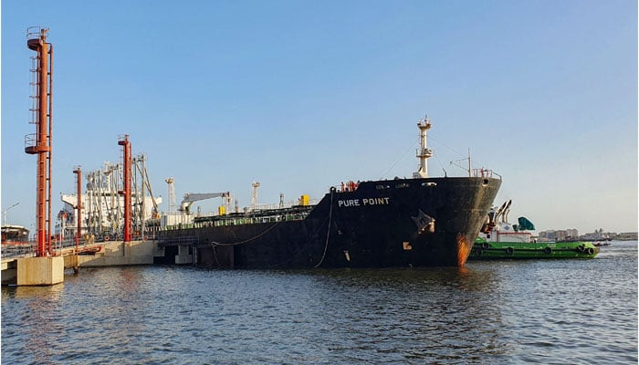 This handout photograph taken on June 11, 2023 and released by the Karachi Port Trust (KPT) shows a Russian cargo ship carrying crude oil at the port in Karachi. — AFP