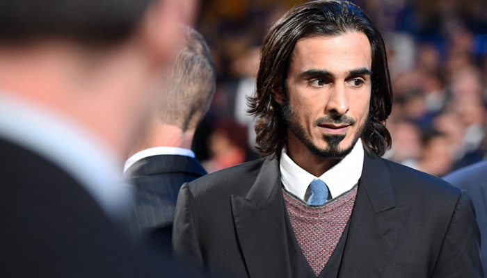 In photo taken on December 1, 2017, shows Qatars Sheikh Jassim Bin Hamad Al-Thani arriving for the 2018 FIFA World Cup football tournament final draw at the State Kremlin Palace in Moscow. — AFP