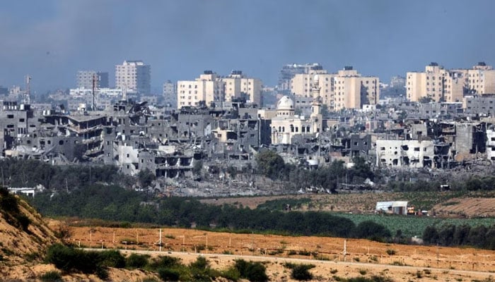 A view shows destroyed buildings in the Gaza Strip as seen from Israels border with the Gaza Strip, in southern Israel October 15, 2023. — Reuters