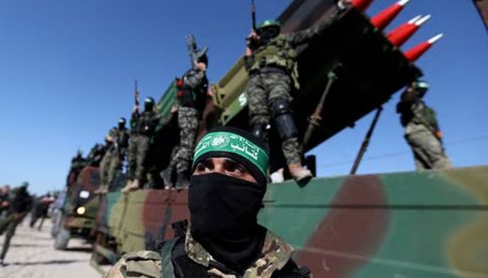 Palestinian Hamas militants attend an anti-Israel rally in Khan Younis, in the southern Gaza Strip May 27, 2021.—Reuters