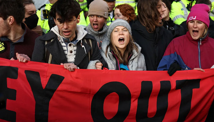 Greta Thunberg joins protesters on the sidelines of the opening day of the Energy Intelligence Forum on October 17, 2023 in London.—AFP