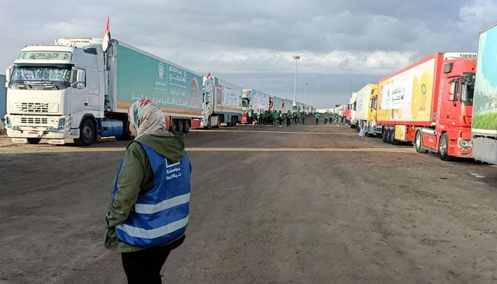 Trucks carrying humanitarian aid from Egyptian NGOs for Palestinians, wait for the reopening of the Rafah crossing at the Egyptian side, to enter Gaza,in Rafah, Egypt October 17, 2023. — Reuters