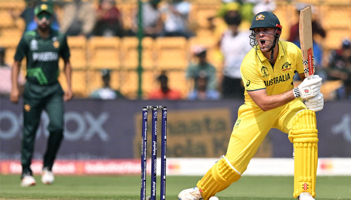 Australia´s Mitchell Marsh reacts after playing a shot during the 2023 ICC Men´s Cricket World Cup one-day international (ODI) match between Australia and Pakistan at the M. Chinnaswamy Stadium in Bengaluru on October 20, 2023. — AFP